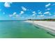 An aerial view of the beach and ocean on a sunny day at 5 Barbados Rd # 31, Englewood, FL 34223