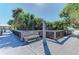 Picturesque boardwalk with a bench overlooking lush tropical scenery at 5 Barbados Rd # 31, Englewood, FL 34223
