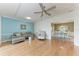 Bright living room featuring hardwood floors, stylish furnishings, and an open layout at 5 Barbados Rd # 31, Englewood, FL 34223