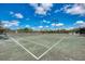 Close-up shot of the community tennis court featuring the net and Boca Royale signage at 5 Barbados Rd # 31, Englewood, FL 34223