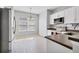 Bright kitchen with stainless steel appliances, white cabinetry, and a window offering natural light and ventilation at 5234 Aqua Breeze Dr, Bradenton, FL 34208