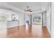 Spacious living room features hardwood floors, recessed lighting, and large sliding glass doors for ample natural light at 5234 Aqua Breeze Dr, Bradenton, FL 34208
