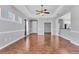 Inviting living room with hardwood floors, recessed lighting, and easy access to the kitchen and other rooms at 5234 Aqua Breeze Dr, Bradenton, FL 34208