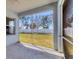 The screened patio offers a relaxing view of the backyard and the trees beyond at 5234 Aqua Breeze Dr, Bradenton, FL 34208
