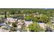 Aerial view of the community showcasing lush landscaping and serene ponds at 5655 Pipers Waite # 27, Sarasota, FL 34235