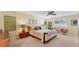 Comfortable bedroom with carpet floors, a ceiling fan, and plenty of natural light at 5655 Pipers Waite # 27, Sarasota, FL 34235