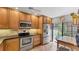 Cozy kitchen with stainless steel appliances, and plenty of cabinet space at 5655 Pipers Waite # 27, Sarasota, FL 34235