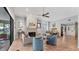Bright living room featuring a fireplace, comfortable seating, and access to the outdoor patio at 5655 Pipers Waite # 27, Sarasota, FL 34235