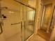 Walk-in shower featuring a handrail at 5962 Roseto Pl, Sarasota, FL 34238