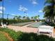 Community bocce ball courts with lush landscaping and benches for relaxing at 5962 Roseto Pl, Sarasota, FL 34238