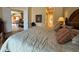 The main bedroom features an open doorway to other rooms in the home at 5962 Roseto Pl, Sarasota, FL 34238