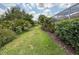 Scenic view of the beautifully maintained lawn and landscaping in the community at 5962 Roseto Pl, Sarasota, FL 34238