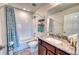 Functional bathroom with a shower-tub combo and granite countertop vanity at 6136 Voyagers Pl, Apollo Beach, FL 33572