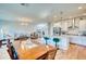 Spacious open-concept design connecting the living room, dining area, and modern kitchen at 6136 Voyagers Pl, Apollo Beach, FL 33572
