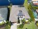 Aerial view of home showing the proximity to the lake with fountain at 6208 Signature Pointe Ln, Bradenton, FL 34210