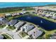 A high angle of the home showing the proximity to the pond and the ocean at 6208 Signature Pointe Ln, Bradenton, FL 34210