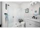 Bathroom featuring glass shower, toilet, and sink with new lighting and fixtures at 6208 Signature Pointe Ln, Bradenton, FL 34210