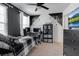 Bedroom featuring black and white decor and a black ceiling fan at 6265 Fairmont Ln, Palmetto, FL 34221