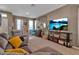 Warm and inviting living room featuring comfortable seating and an open floor plan at 6265 Fairmont Ln, Palmetto, FL 34221