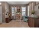 Inviting living space featuring neutral tones, a window filled with natural light, and tile floors at 6265 Fairmont Ln, Palmetto, FL 34221