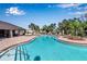 A luxurious pool area with a covered pavilion and ample seating makes for resort style living in this attractive community at 6265 Fairmont Ln, Palmetto, FL 34221