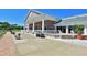 Exterior view of the clubhouse with manicured landscaping, offering a central hub for community activities at 6514 Stone River Rd, Bradenton, FL 34203