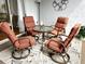 Cozy screened lanai with comfortable seating for outdoor relaxation and entertaining at 6707 Stone River Rd # 105, Bradenton, FL 34203