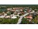 Picturesque aerial view of a residential neighborhood with lush landscaping and serene ponds at 7118 42Nd E Ct, Sarasota, FL 34243