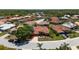 Aerial view of a residential community with well-maintained homes and green spaces at 7118 42Nd E Ct, Sarasota, FL 34243