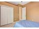 Bedroom featuring large closet and neutral walls at 7118 42Nd E Ct, Sarasota, FL 34243