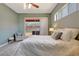 Bedroom featuring backyard access, with neutral walls, and ceiling fan at 7118 42Nd E Ct, Sarasota, FL 34243