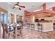 Spacious open-concept kitchen and dining area with large island and bar seating at 7118 42Nd E Ct, Sarasota, FL 34243