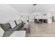 Spacious living room with open layout, dining area, and comfortable seating at 7211 Antigua Pl, Sarasota, FL 34231