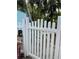 White picket fence surrounds the backyard, providing privacy at 728 41St St St, Sarasota, FL 34234