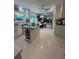 Bright, modern kitchen features a center island, stainless steel appliances, and tile flooring at 728 41St St St, Sarasota, FL 34234