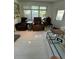 Inviting living room with comfortable seating and ample natural light from the large windows at 728 41St St St, Sarasota, FL 34234
