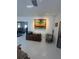 Open-concept room with neutral paint, tile flooring, and recessed lights at 728 41St St St, Sarasota, FL 34234