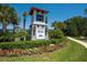 Community entrance with stone accents, lush landscaping, and clear signage welcoming residents and visitors alike at 7424 Ridgelake Cir, Bradenton, FL 34203