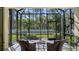 Enjoy outdoor living on the screened lanai with views of the well-maintained backyard at 7424 Ridgelake Cir, Bradenton, FL 34203