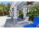 A covered lounge area with comfortable seating provides a relaxing space for residents to unwind and socialize at 7424 Ridgelake Cir, Bradenton, FL 34203