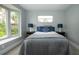 Bright bedroom featuring bay window and neutral color scheme at 800 Everest Rd, Venice, FL 34293