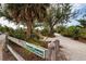 Charming butterfly garden path, featuring lush greenery and natural beauty at 800 Everest Rd, Venice, FL 34293