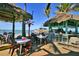 Beachside outdoor bar with thatched roof and seating overlooking the ocean at 800 Everest Rd, Venice, FL 34293