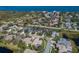 Aerial shot of a cozy neighborhood, close to beautiful blue ocean, and lush environment at 8861 17Th Avenue Nw Cir, Bradenton, FL 34209