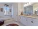 Bathroom featuring a double vanity, soaking tub, and natural light at 8861 17Th Avenue Nw Cir, Bradenton, FL 34209