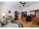A well-appointed home office offers built-in cabinetry, a desk, and comfortable seating for productive work at 8861 17Th Avenue Nw Cir, Bradenton, FL 34209