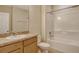 Bright bathroom featuring a single sink vanity and a shower-tub combination at 8996 Excelsior Loop, Venice, FL 34293