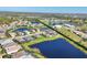 Scenic aerial view showcasing the community's beautiful ponds, landscaping, and well-maintained homes at 1014 Calico Gln, Bradenton, FL 34212