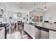Kitchen and dining area with modern stainless steel appliances and access to the outdoor patio at 1014 Calico Gln, Bradenton, FL 34212