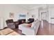 Cozy living space with hardwood floors, comfortable seating, and an open layout, perfect for relaxing or entertaining at 1014 Calico Gln, Bradenton, FL 34212